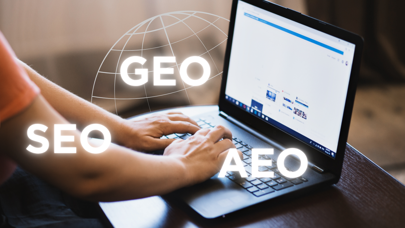 Person typing on laptop with SEO GEO AEO graphic overlay